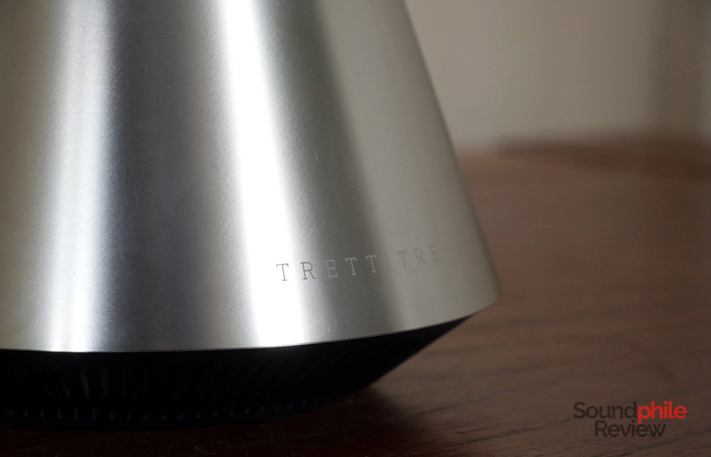 The company logo is laser-etched on the TRETTITRE TreSound Mini's metal body