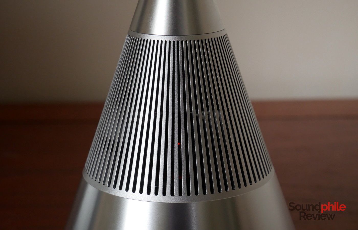 The TRETTITRE TreSound Mini has vertical slits from where the sounds comes out