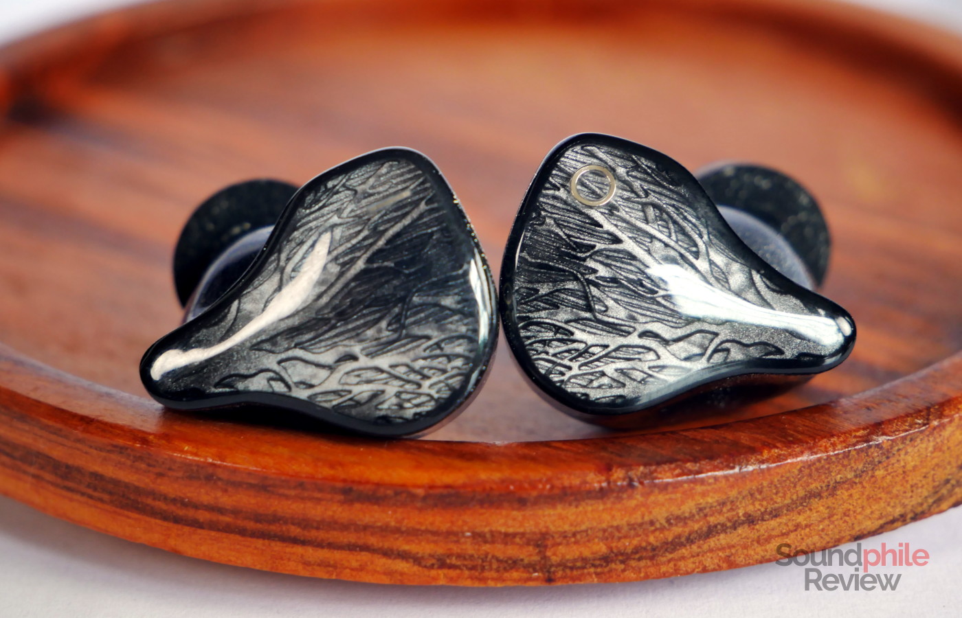 The faceplates of the IO Audio SOGNO feature tree-like shapes
