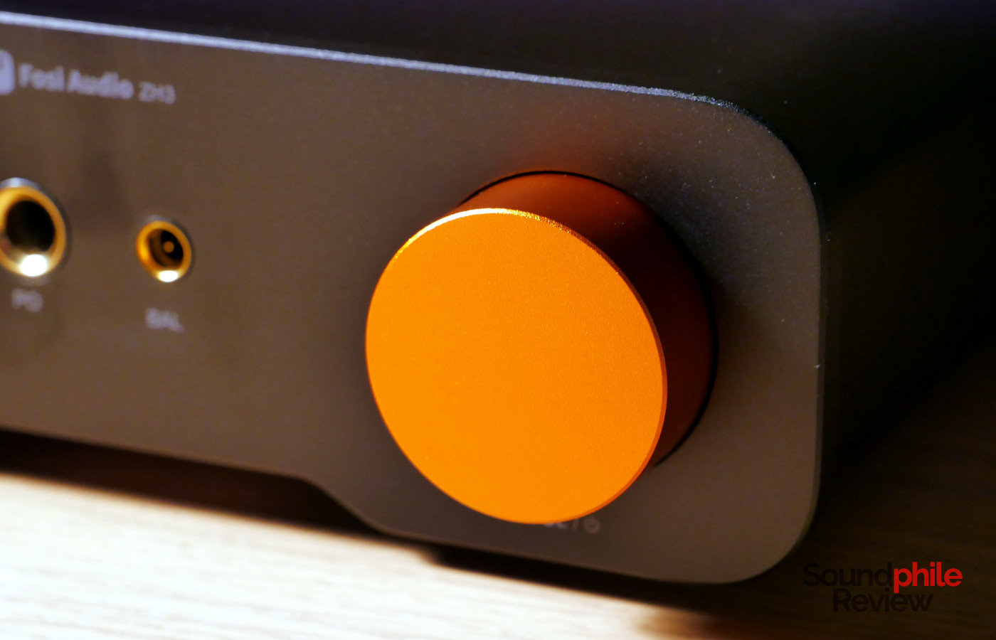 The Fosi Audio ZH3 has a big orange volume wheel