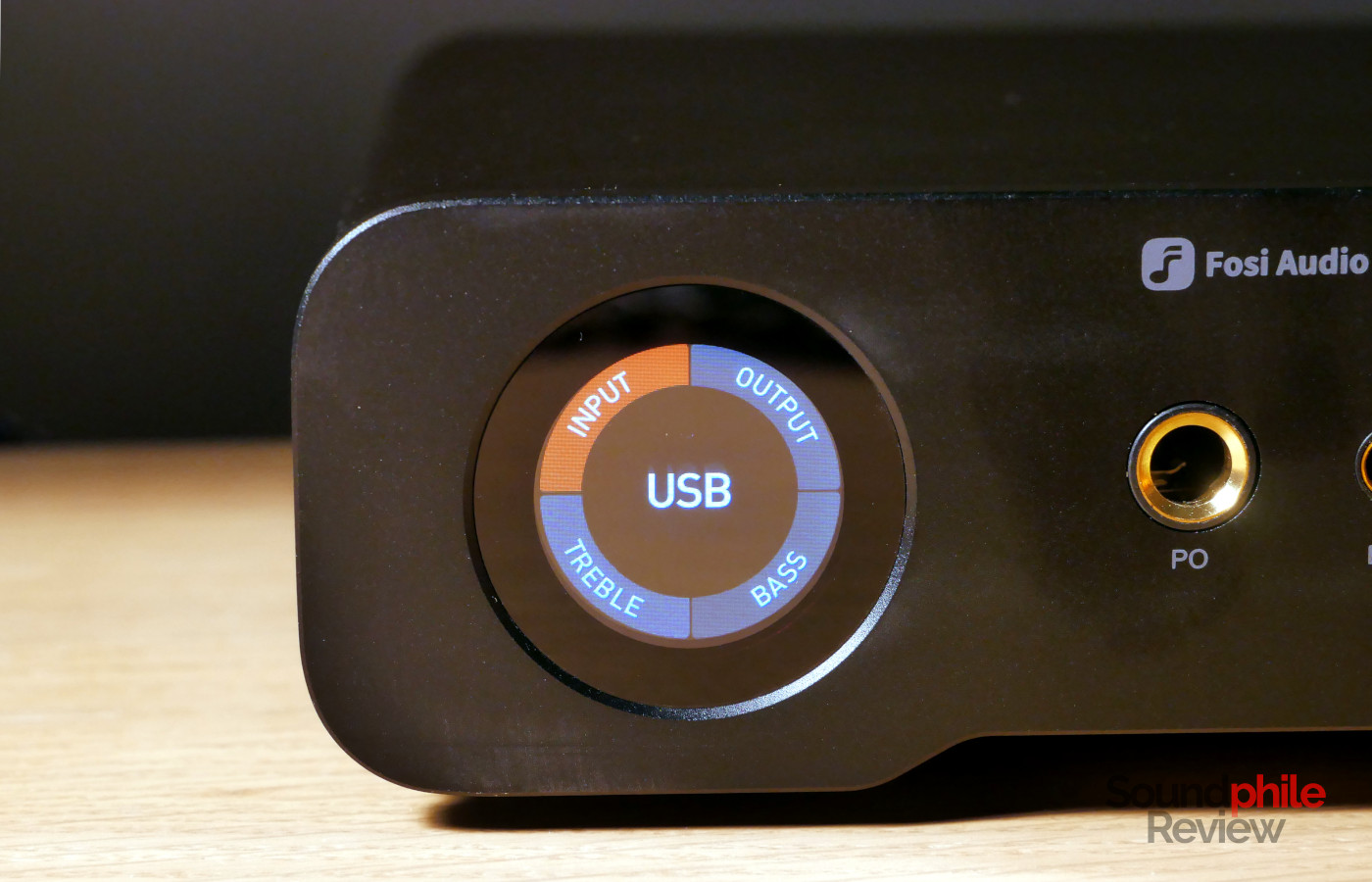 You can control the various option on the Fosi Audio ZH3's screen using the remote or the volume wheel