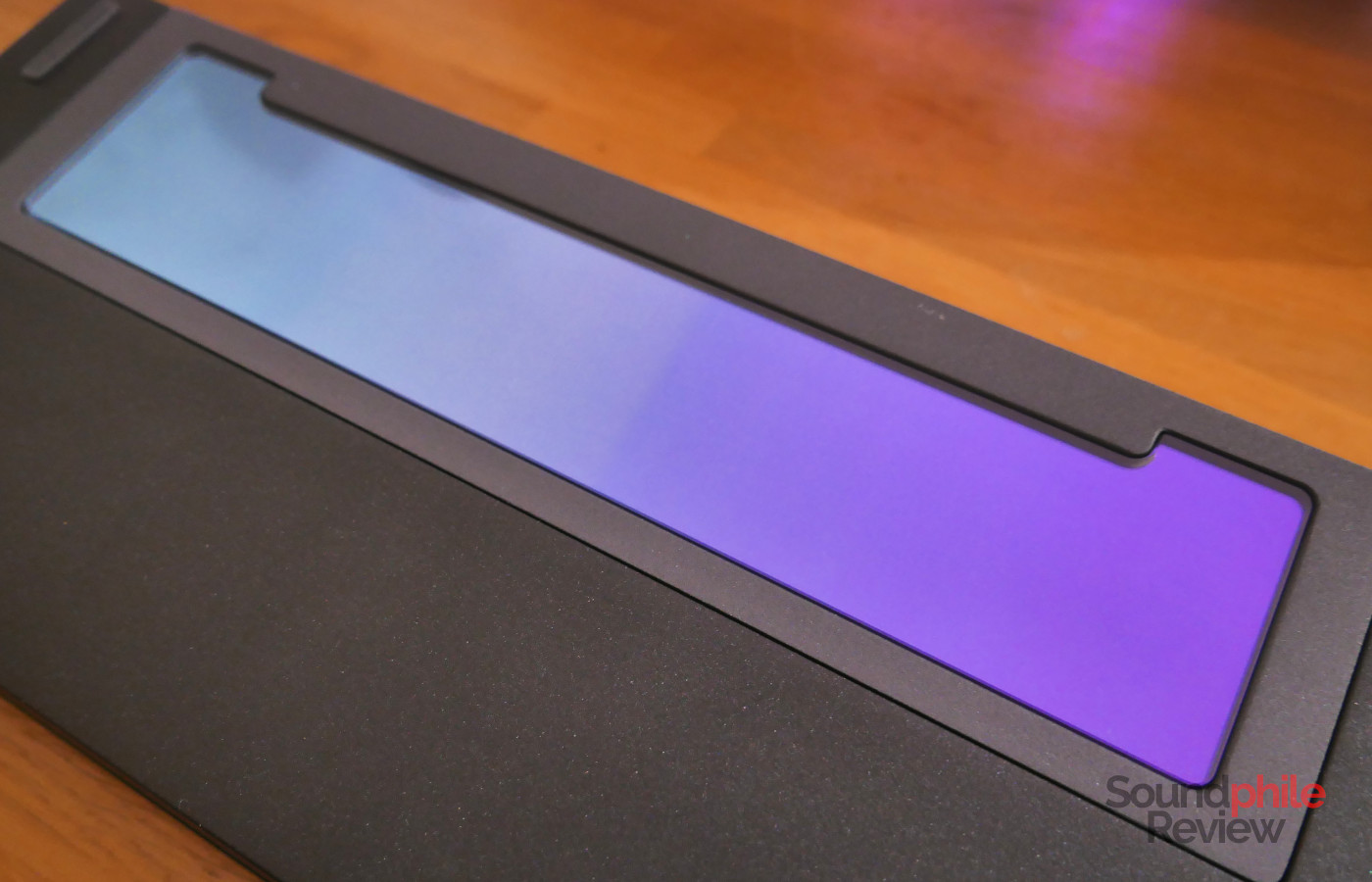 On the bottom of the Womier SK75 TMR there is a chrome-coloured weight