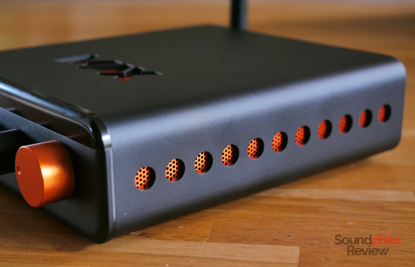 The sides of the Fosi Audio BT20A Max have holes with a protective grille to help with ventilation