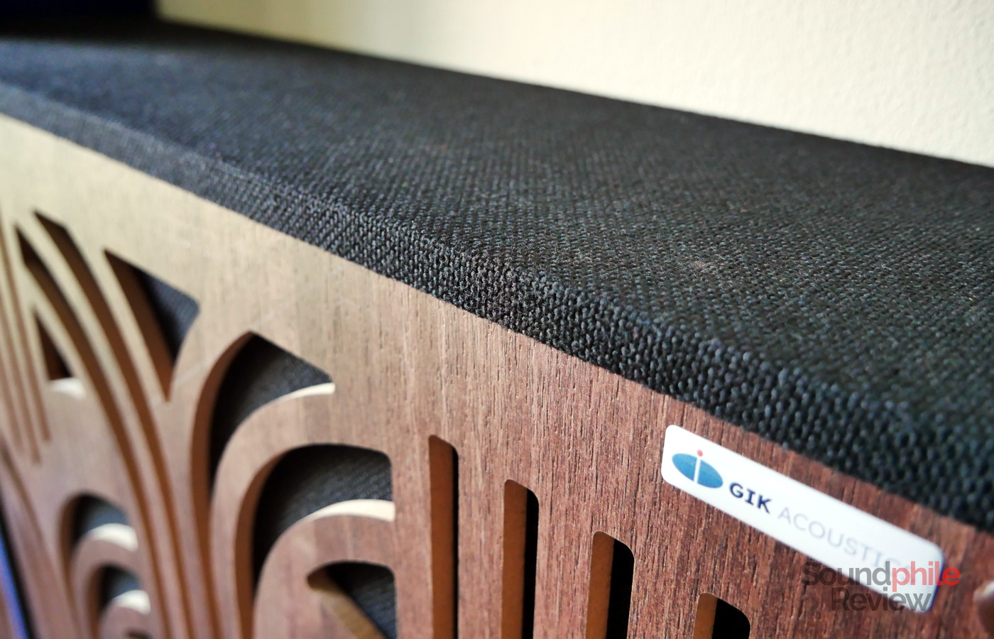 Close-up of a GIK Acoustics Amplitude panel showing the fabric