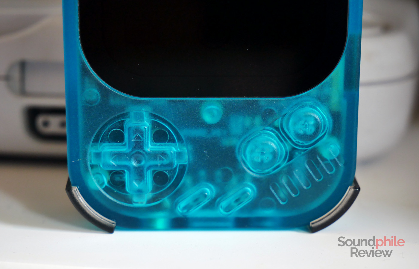 The Hidizs AP30 Music Boy features a D-pad and four other buttons (A, B, plus two unnamed buttons)