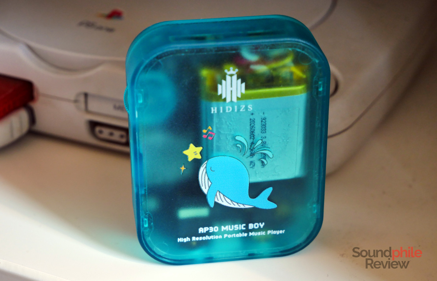 On the back of the Hidizs AP30 Music Boy there is a cute illustration of a whale