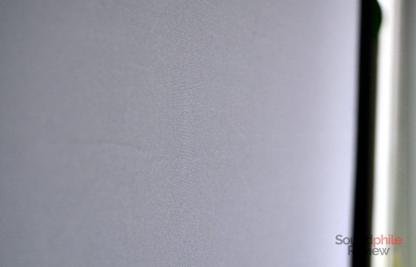 Picture that shows how the fabric of the Nebula projector screen is smooth.